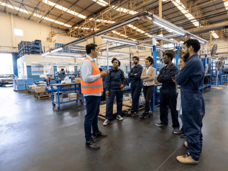 Instructing Factory Workers